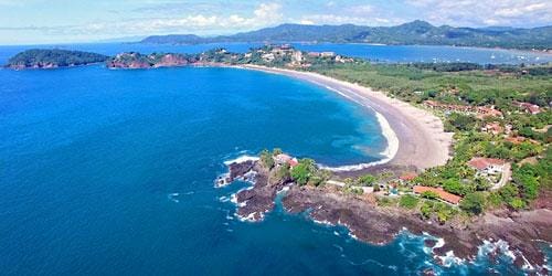 Flamingo Beach aerial view from the south of the town